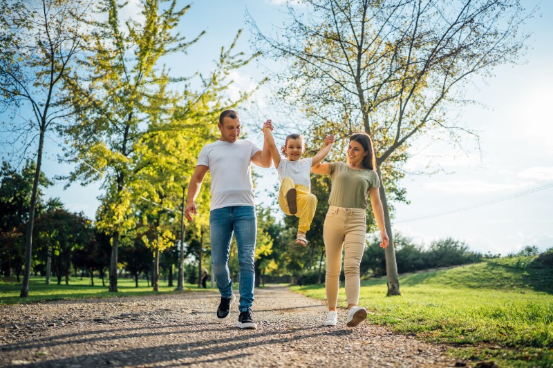 Happy family enjoying in the park