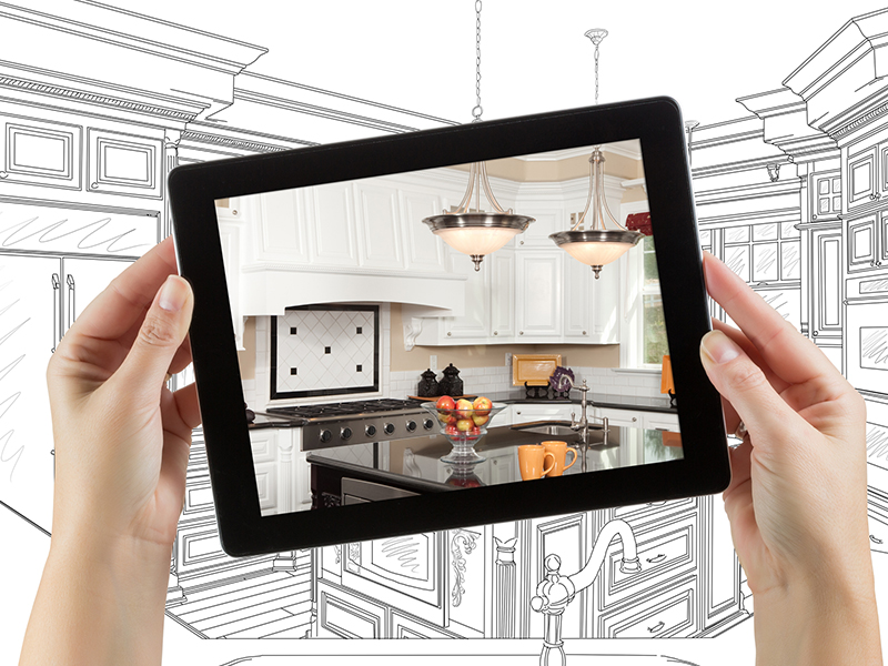 woman holding tablet with Kitchen visual design