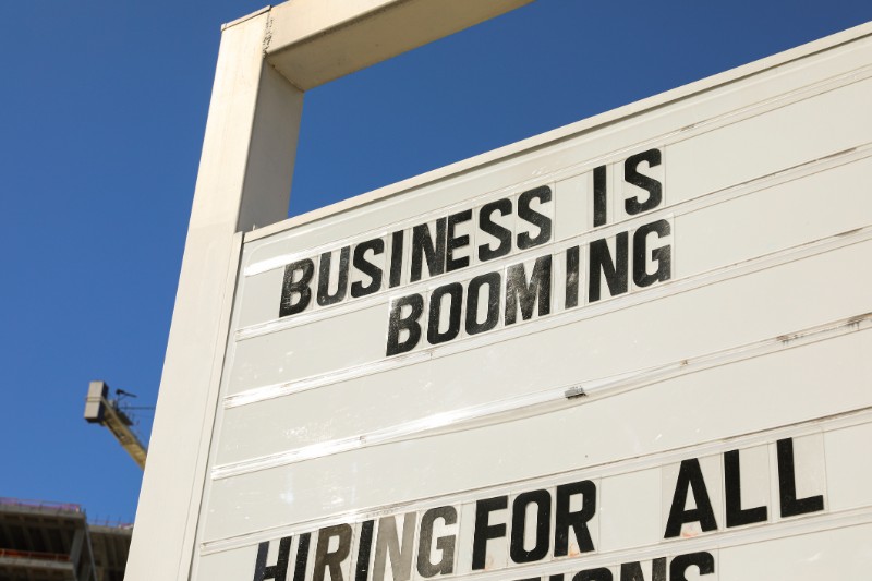 Business is booming exterior sign