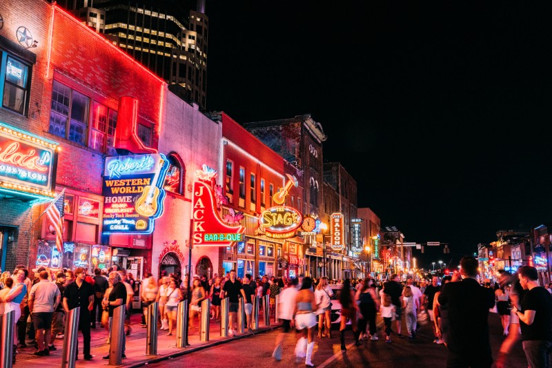 Long Exposure view of Broadway, Downtown Nashville, Tennessee filled with tourists on a Friday night