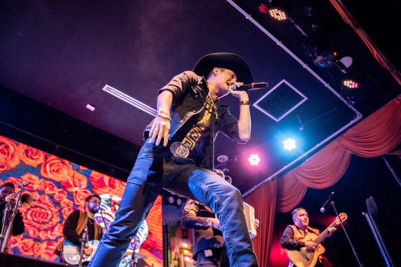 Cowboy rocking on stage